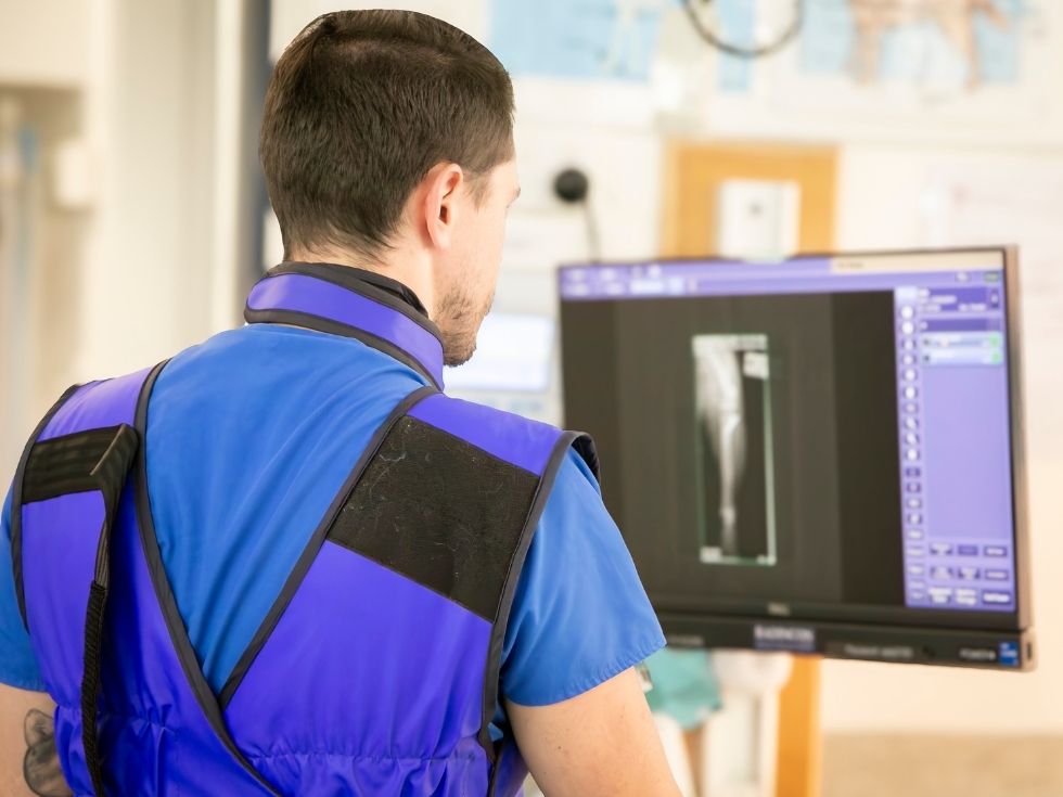 Radiologist viewing X-ray images